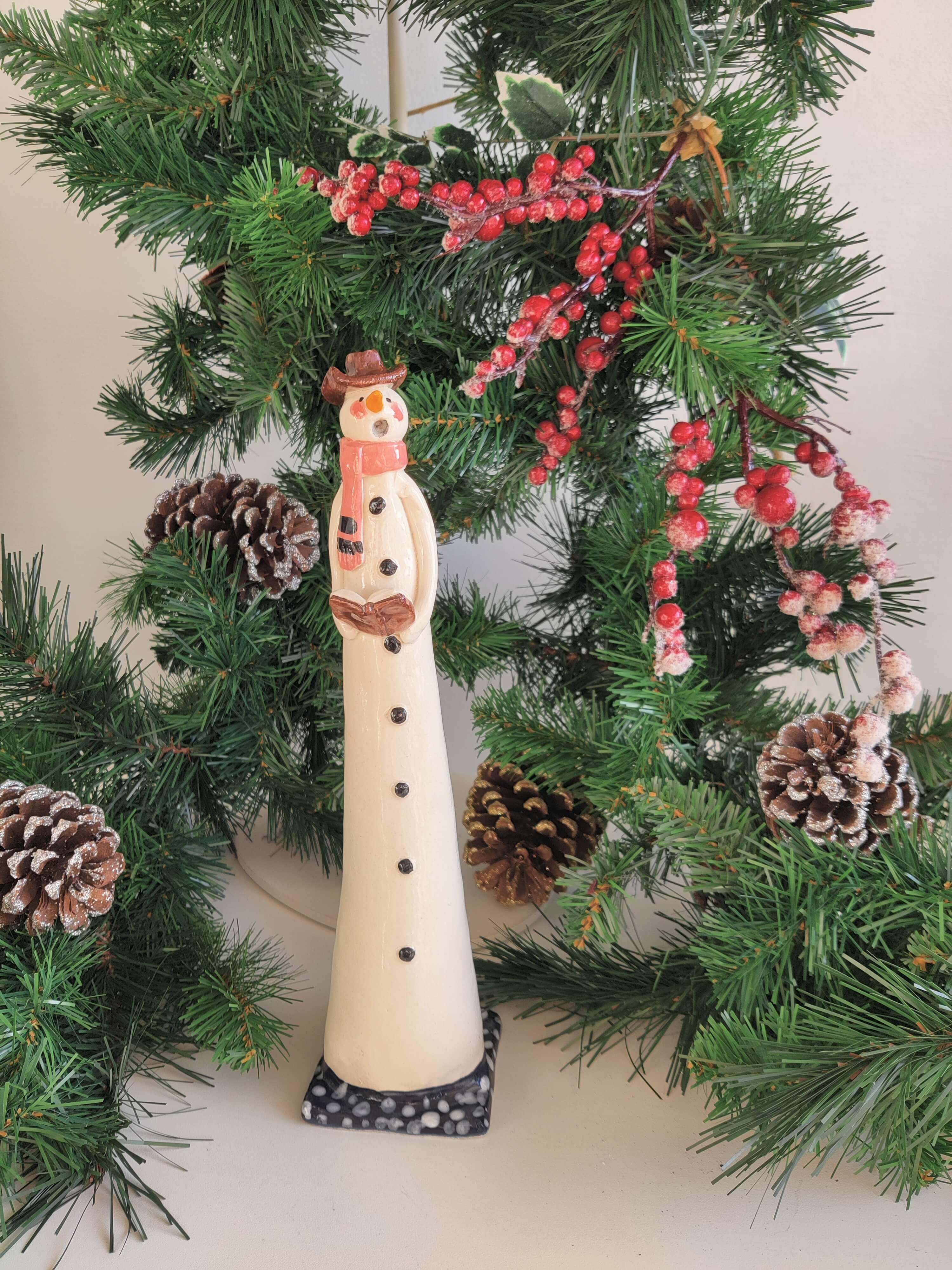 Joanne Robey, Snowman Carol Singer with a Pink Striped Scarf *For Click & Collect Only*