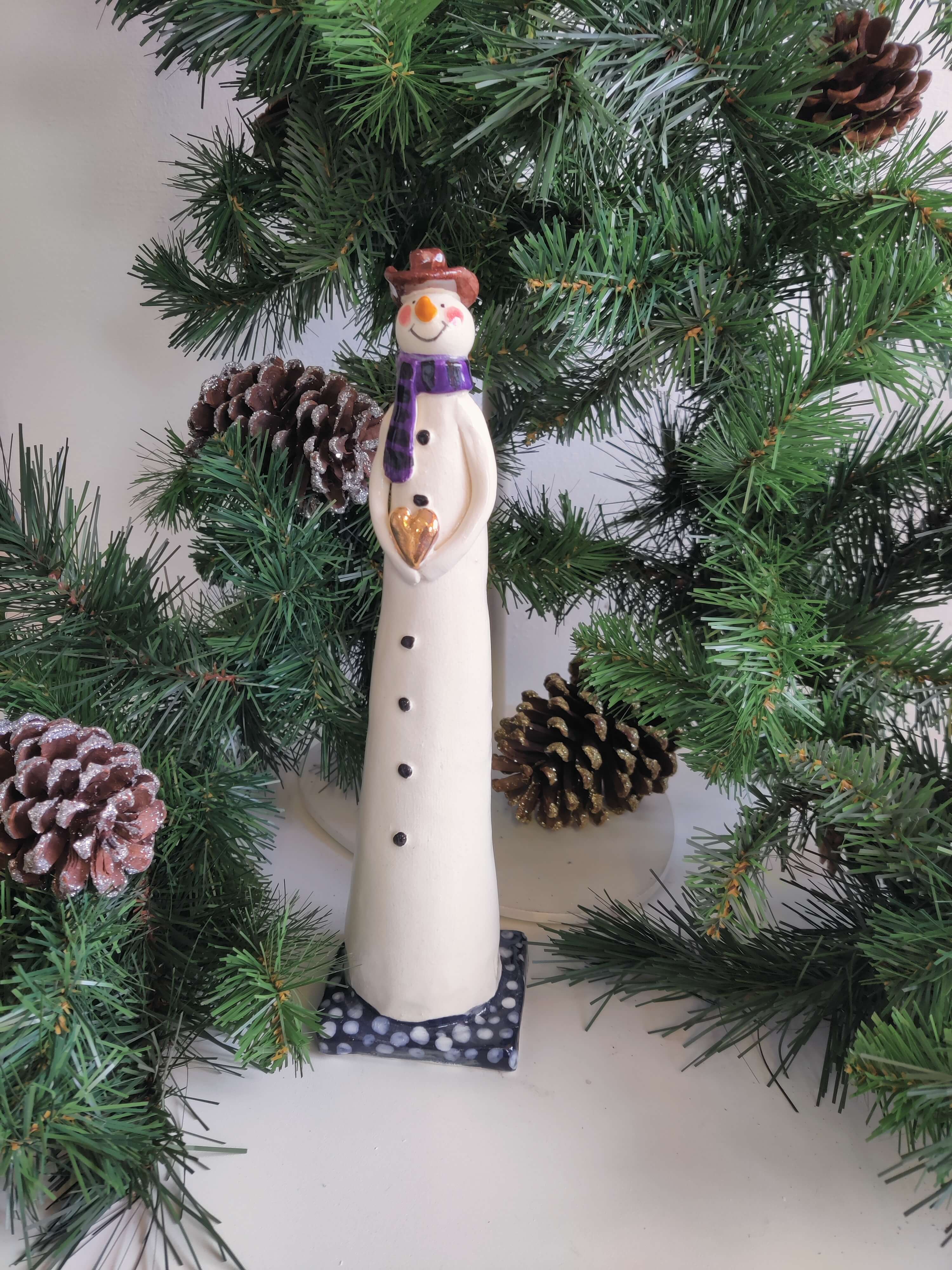 Joanne Robey, Snowman Purple Stripe Scarf holding a Golden Heart *For Click and Collect only*