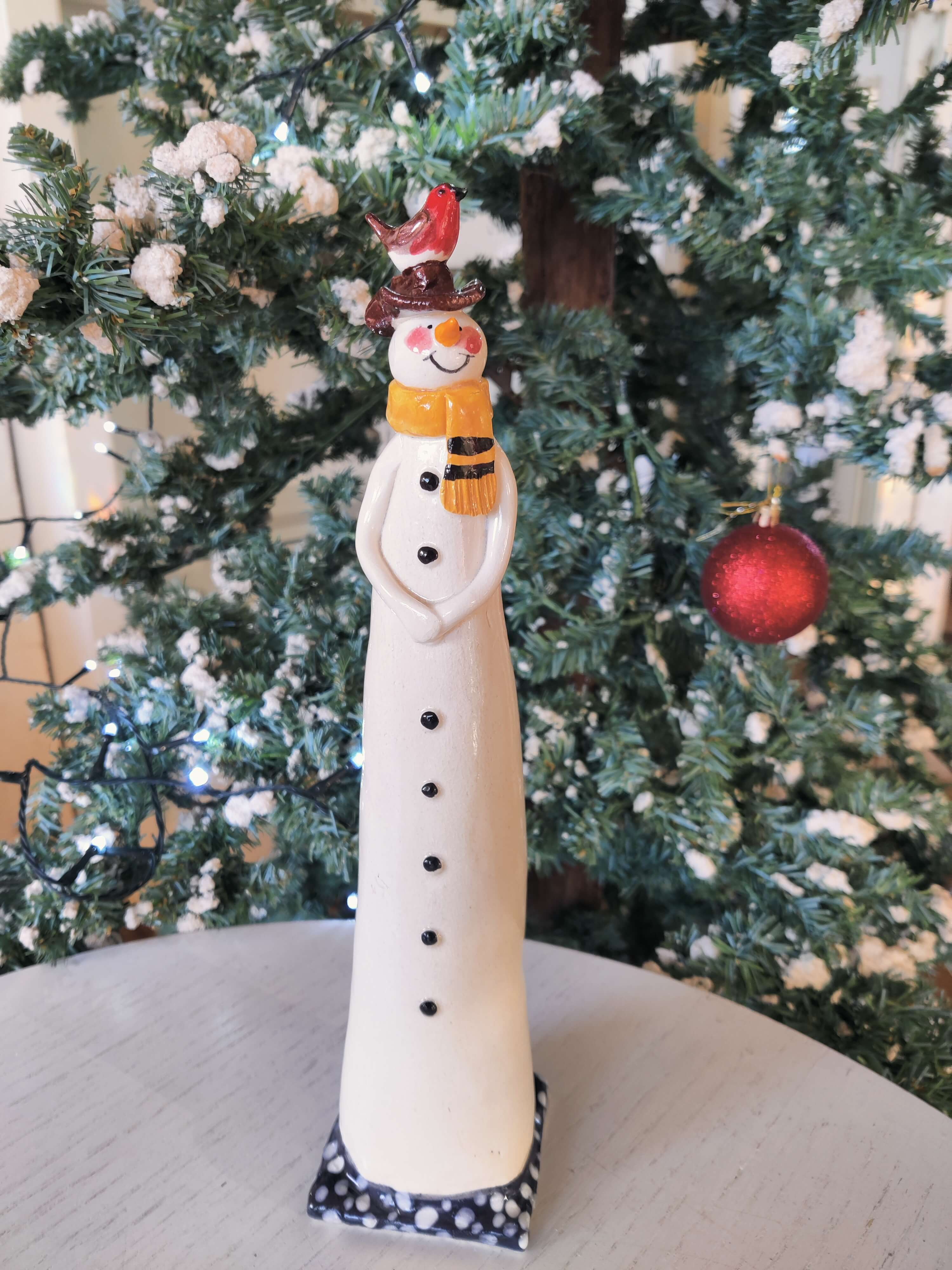 Joanne Robey, Snowman with a Yellow Striped Scarf and a Robin on his head