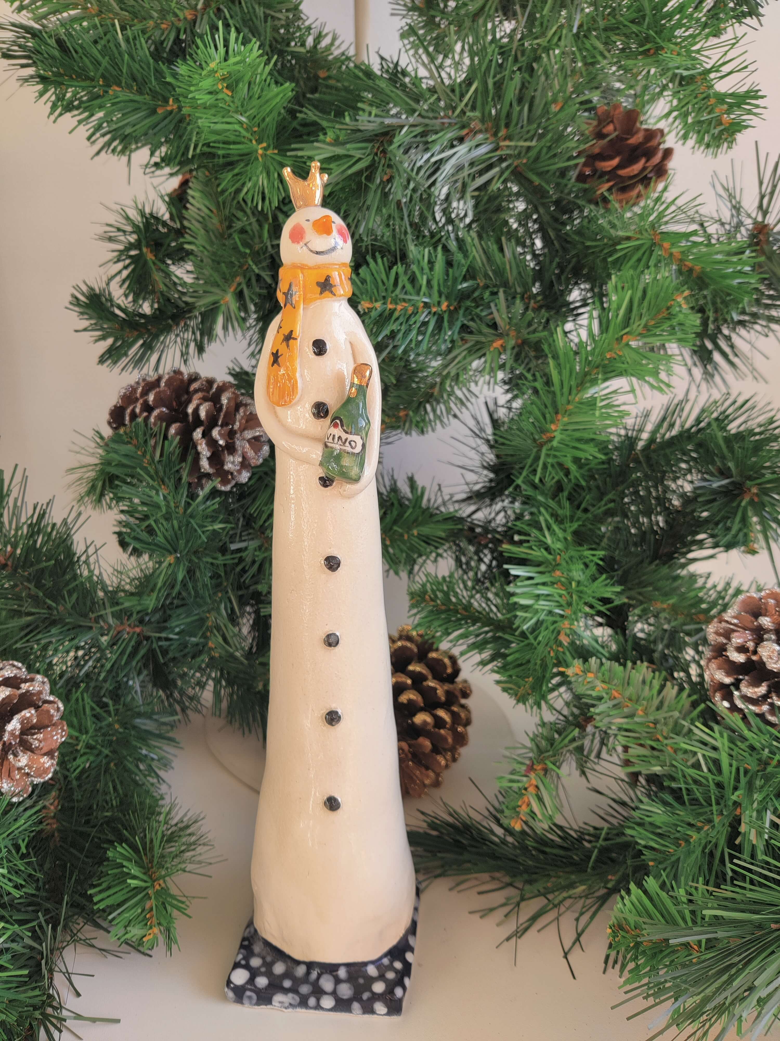 Joanne Robey, Snowman with a golden crown, yellow scarf and a bottle of wine *For Click and Collect only*