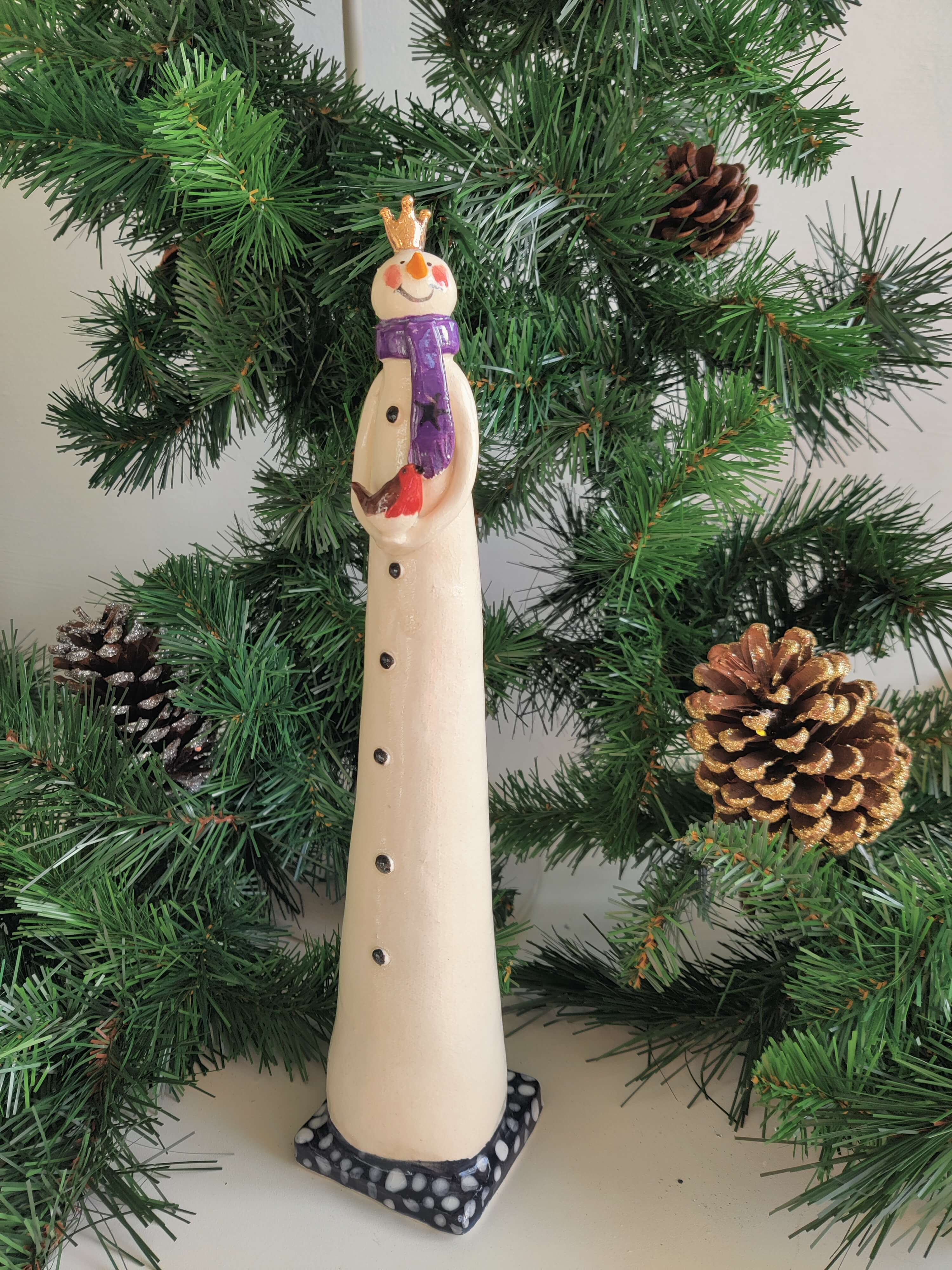 Joanne Robey, Snowman with a Purple Polka Scarf and Golden Crown holding A Robin *For click and collect only*